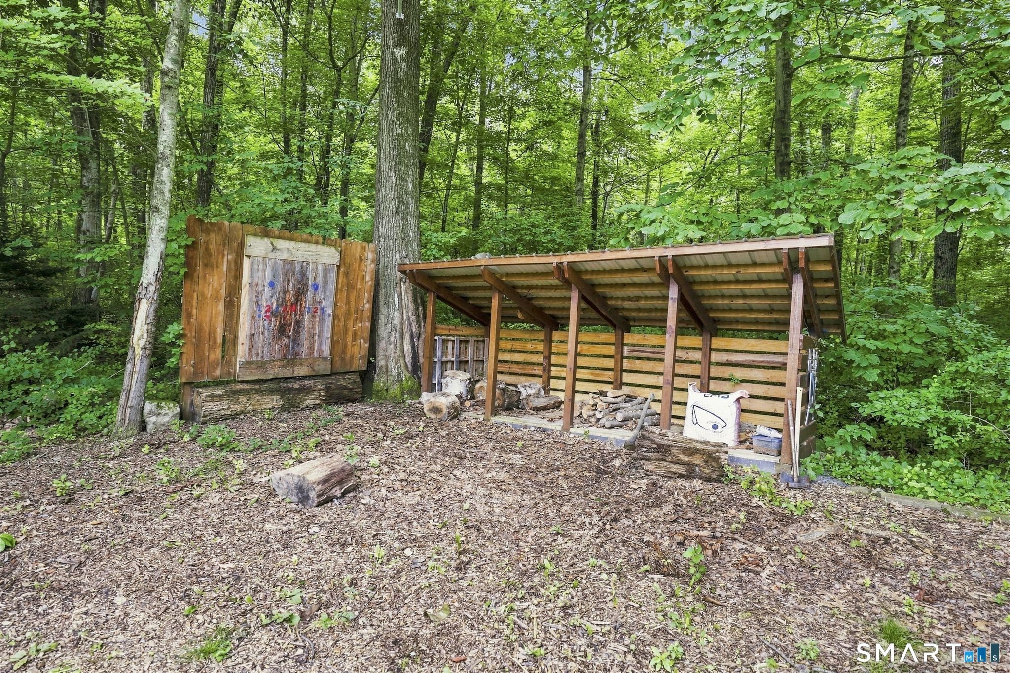 467 Somers Road Ellington, CT 06029 - Photo 27 of 37 Axe throwing station