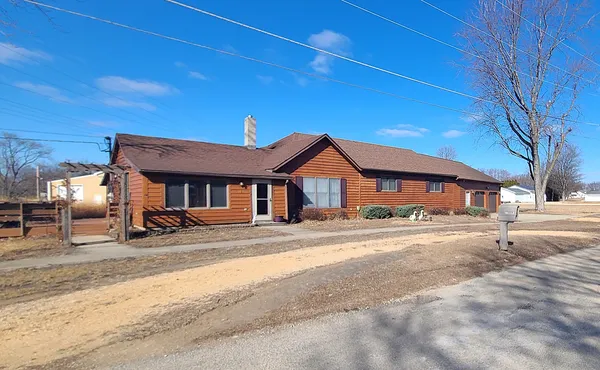 a view of a house with a patio