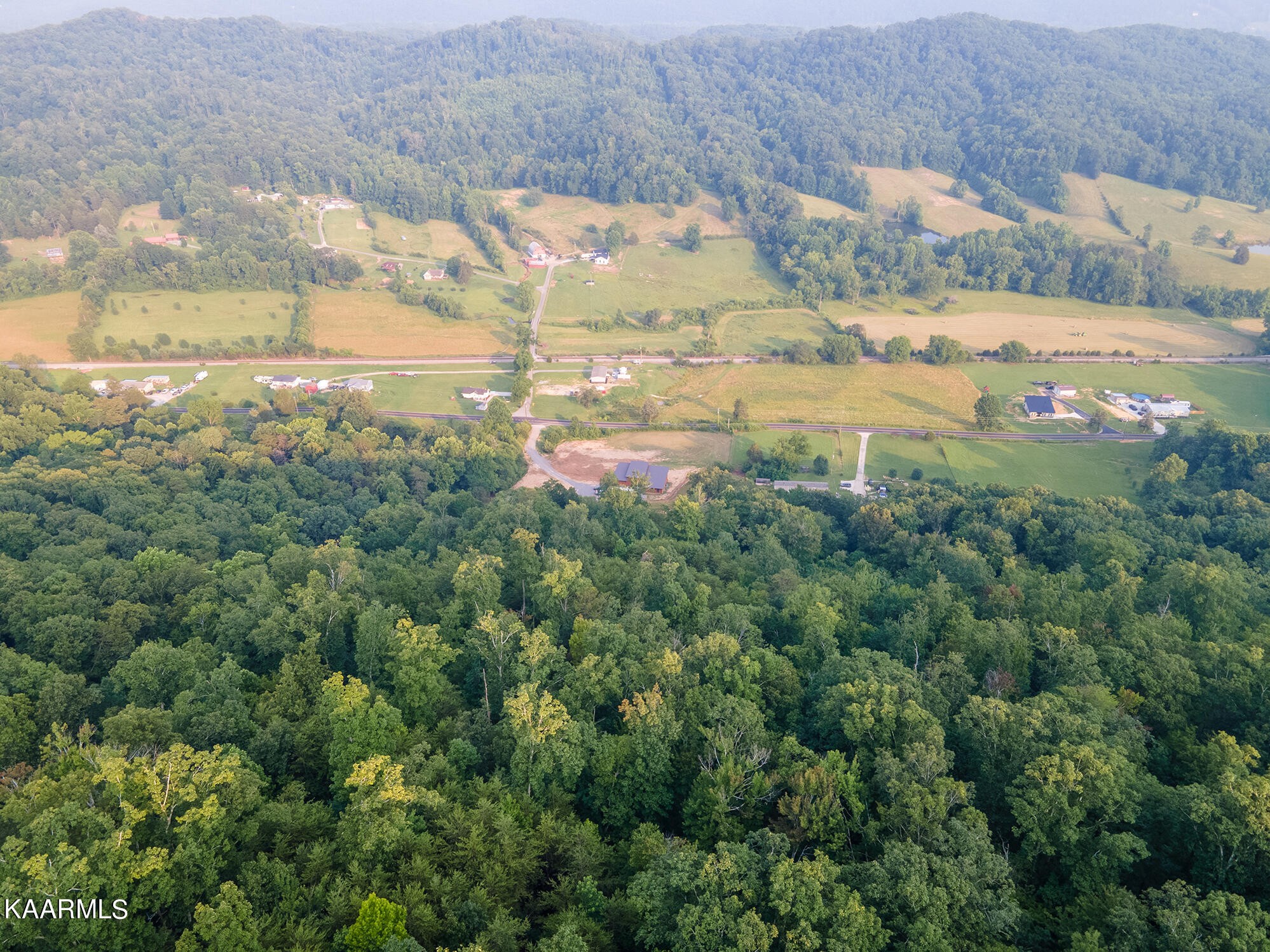 1391 Dutch Valley Road Clinton, TN 37716 - Photo 40 of 44 a view of an outdoor space and a yard