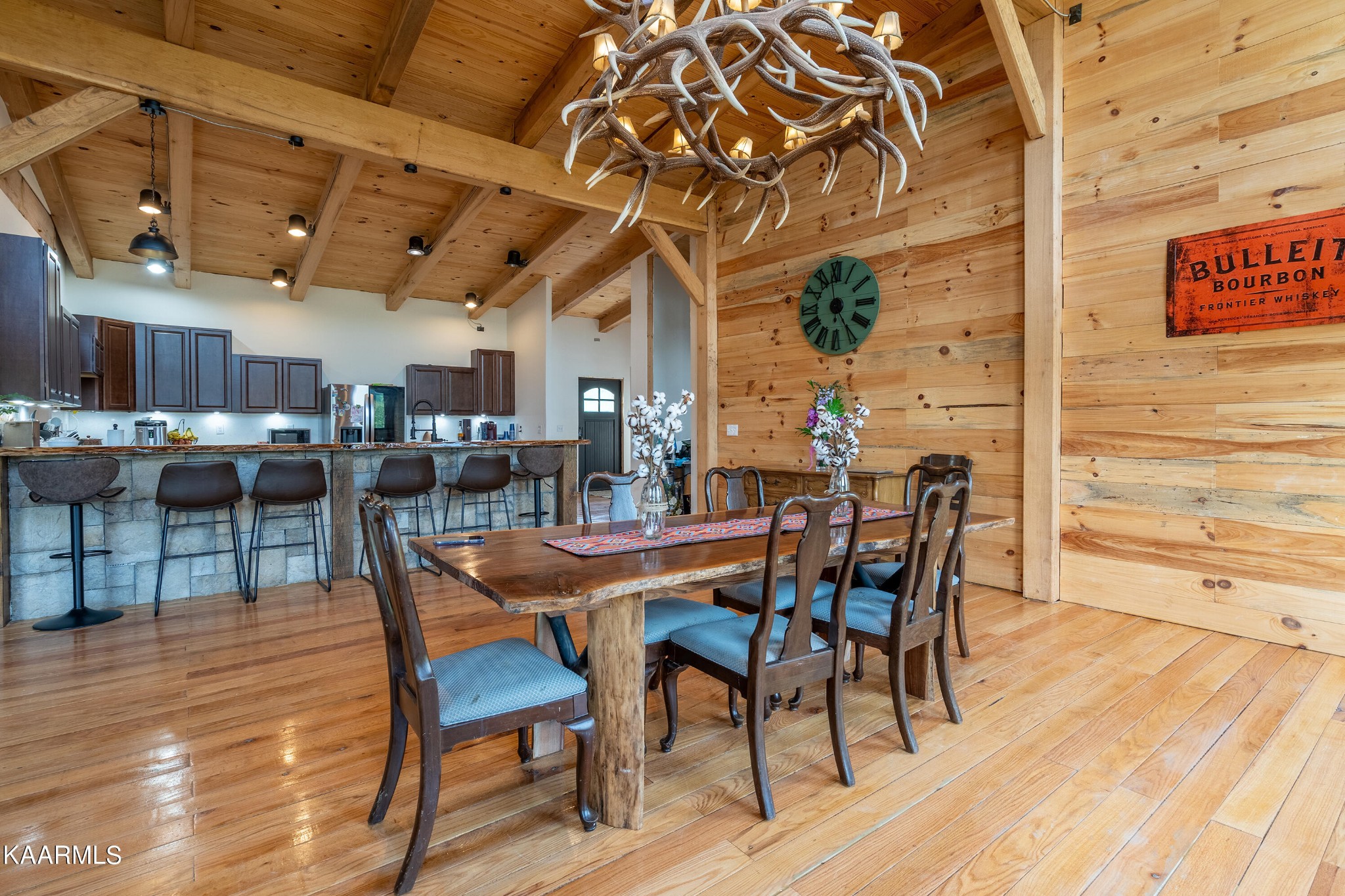 1391 Dutch Valley Road Clinton, TN 37716 - Photo 8 of 44 a view of a dining room with furniture and wooden floor