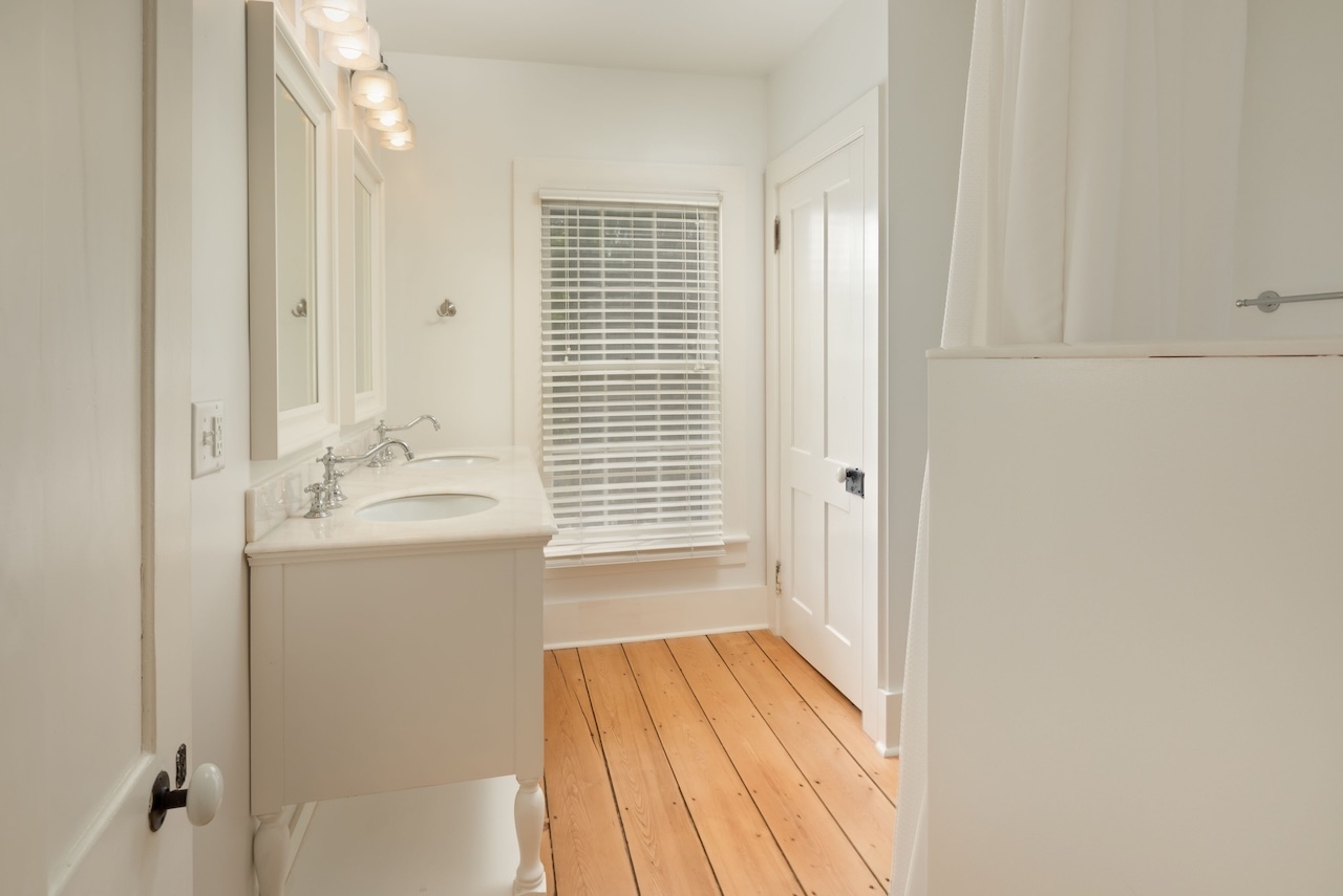 14 Library Street, Unit A Salisbury, CT 06068 - Photo 11 of 14 a bathroom with a sink a mirror and a shower