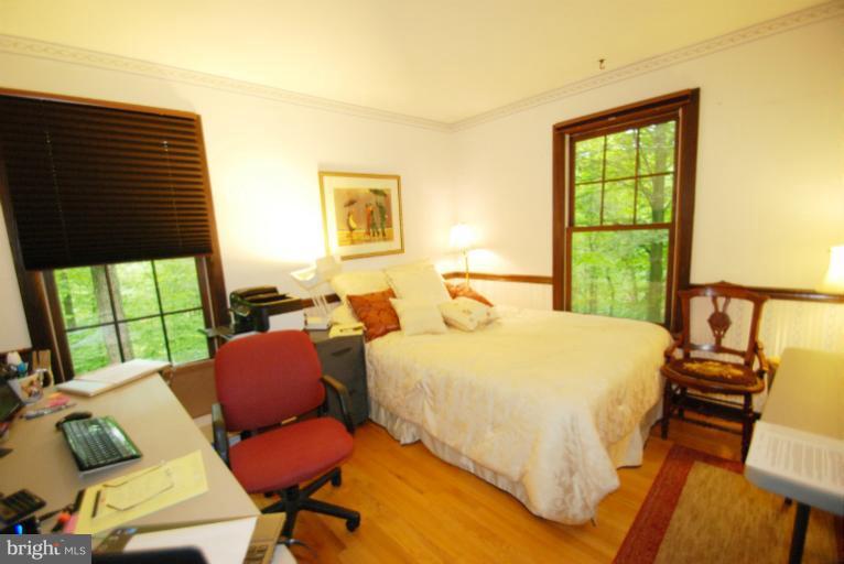 14123 Sunnybrook Road Phoenix, MD 21131 - Photo 17 of 30 a bedroom with a bed and a window