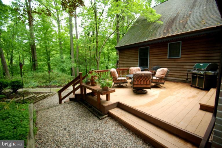 14123 Sunnybrook Road Phoenix, MD 21131 - Photo 27 of 30 a view of a backyard with furniture