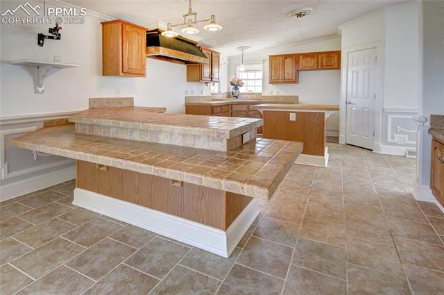 5607 Antelope Road Fountain, CO 80817 - Photo 16 of 49 Kitchen Breakfast Bar