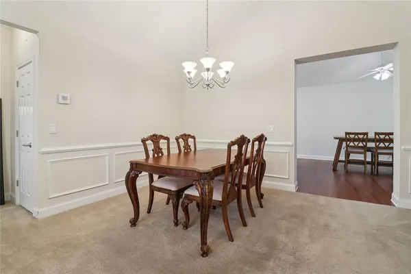 a view of a dining room with furniture