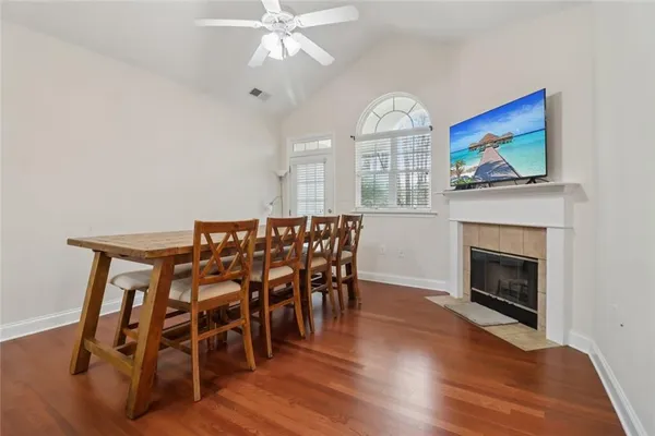 a dining room with furniture window wooden floor