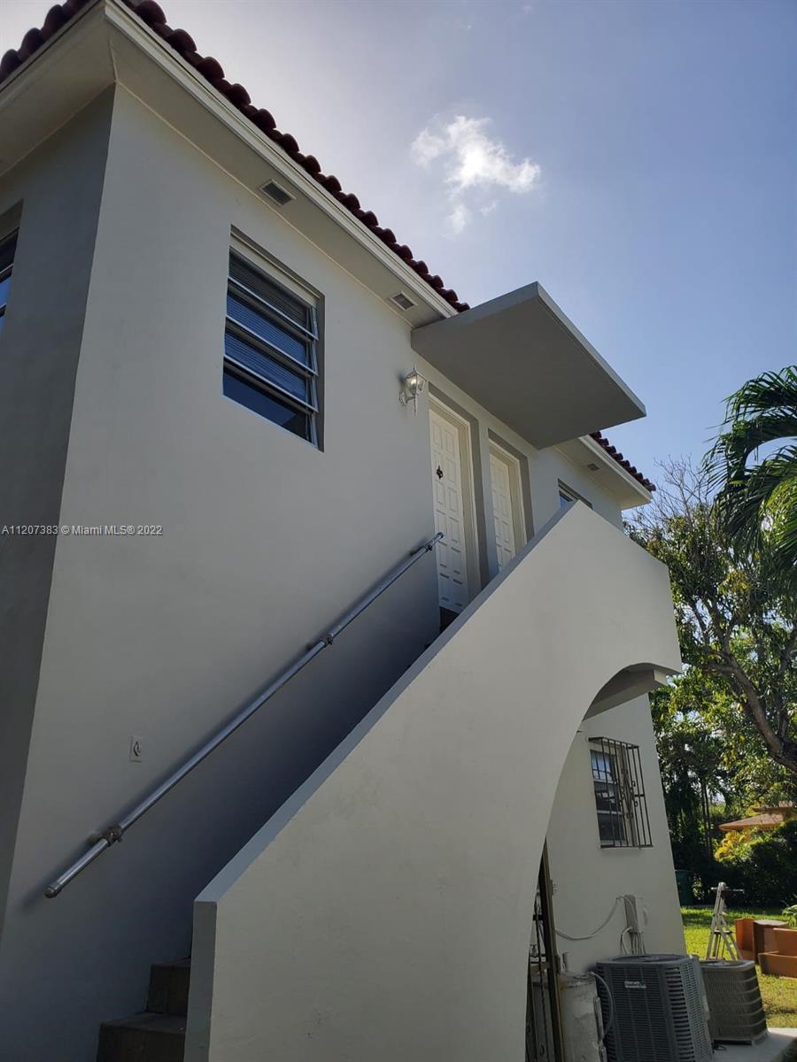 1254 Southwest 13th Avenue Miami, FL 33135 - Photo 2 of 7 a view of a house with roof