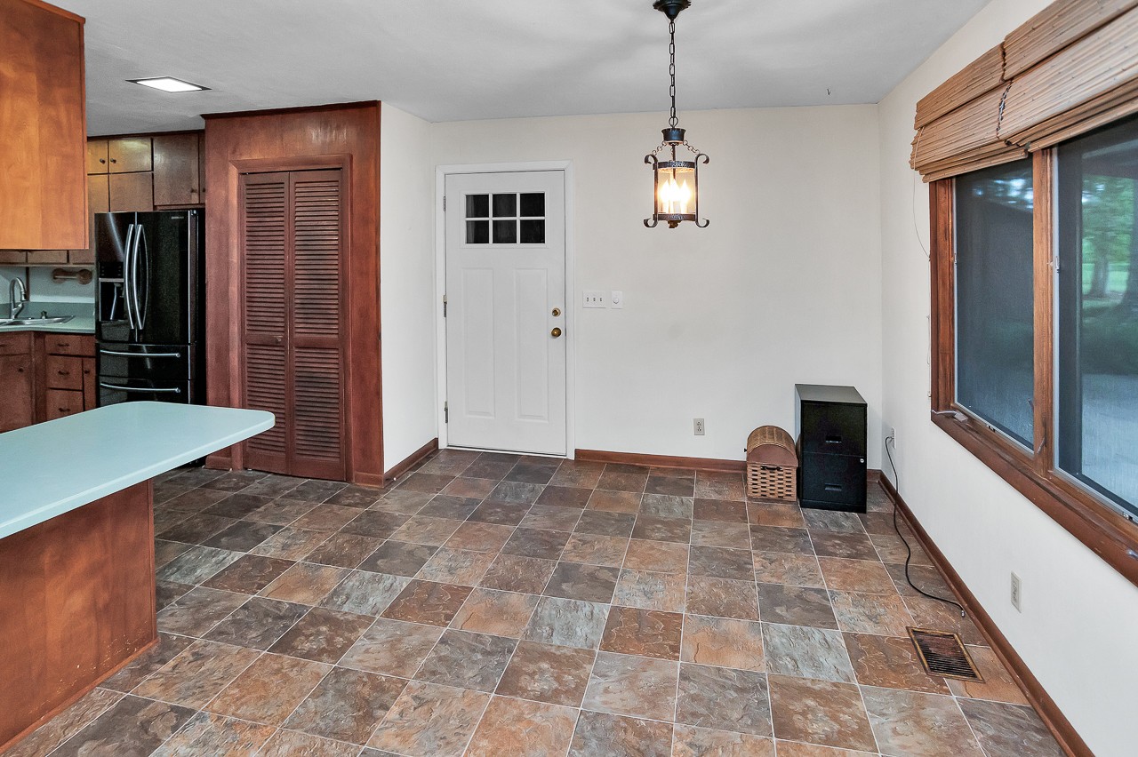 253 Hunter Road Fayetteville, TN 37334 - Photo 16 of 61 a view of a hallway with a dining table and chairs