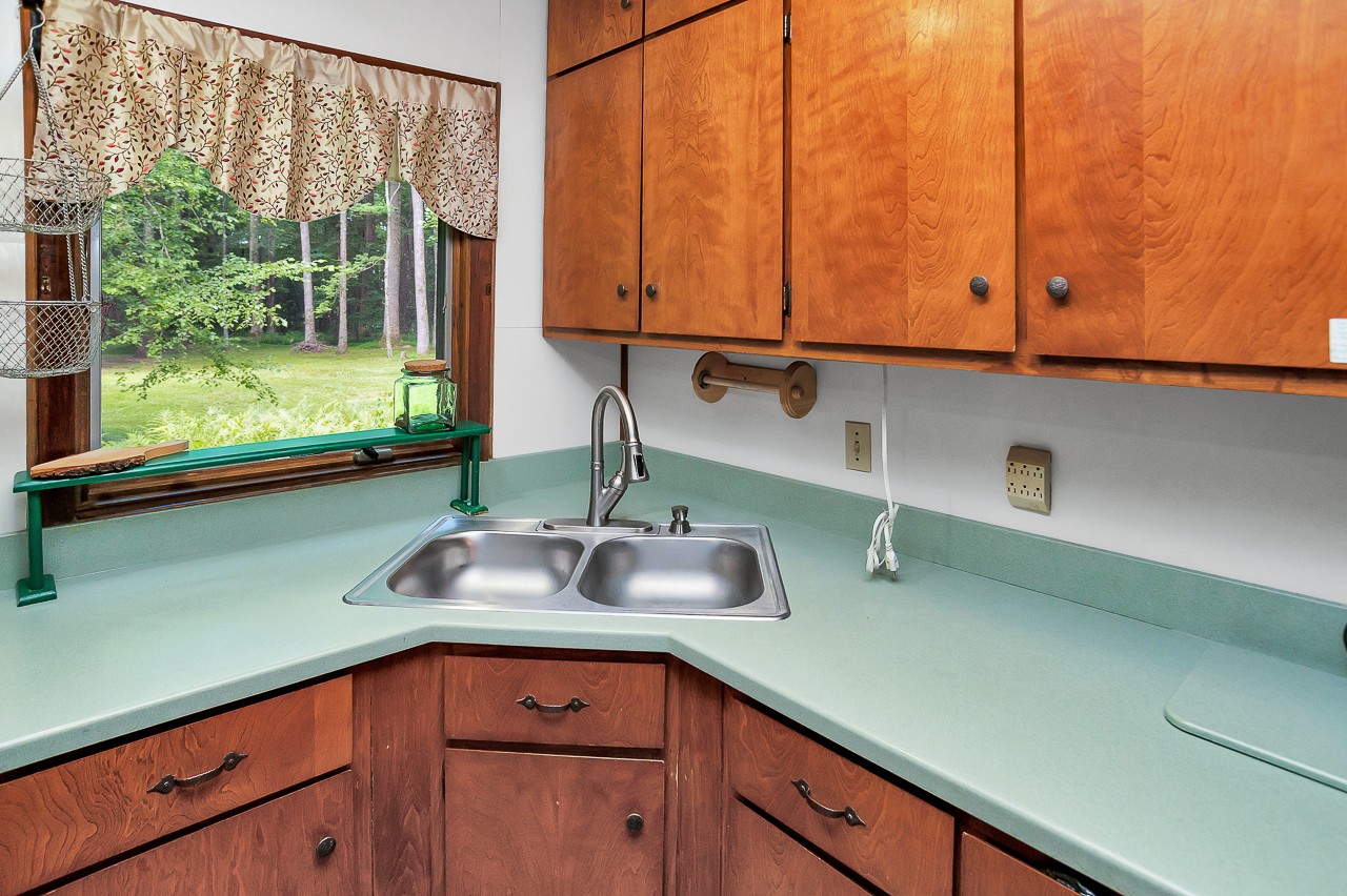 253 Hunter Road Fayetteville, TN 37334 - Photo 21 of 61 a kitchen with a sink and a window
