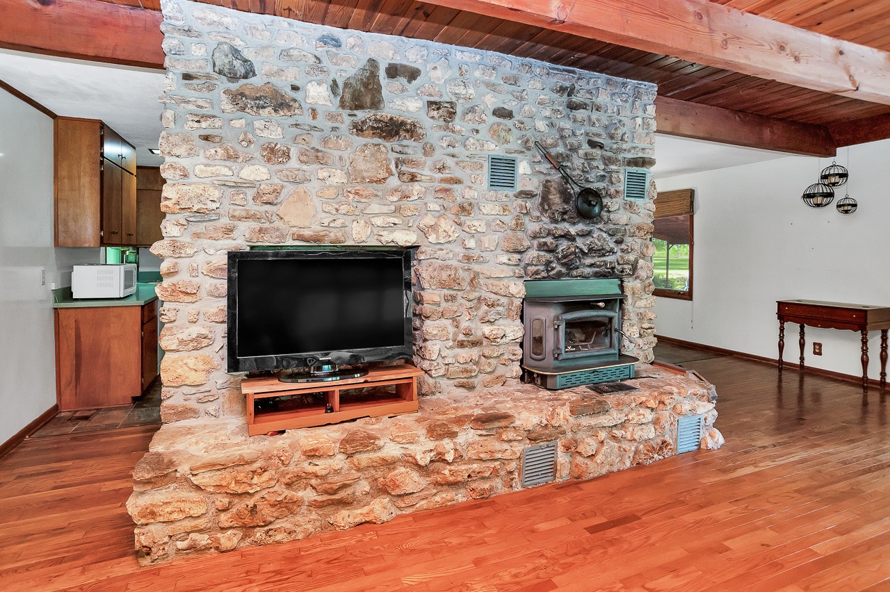 253 Hunter Road Fayetteville, TN 37334 - Photo 29 of 61 a living room with fireplace furniture and a flat screen tv