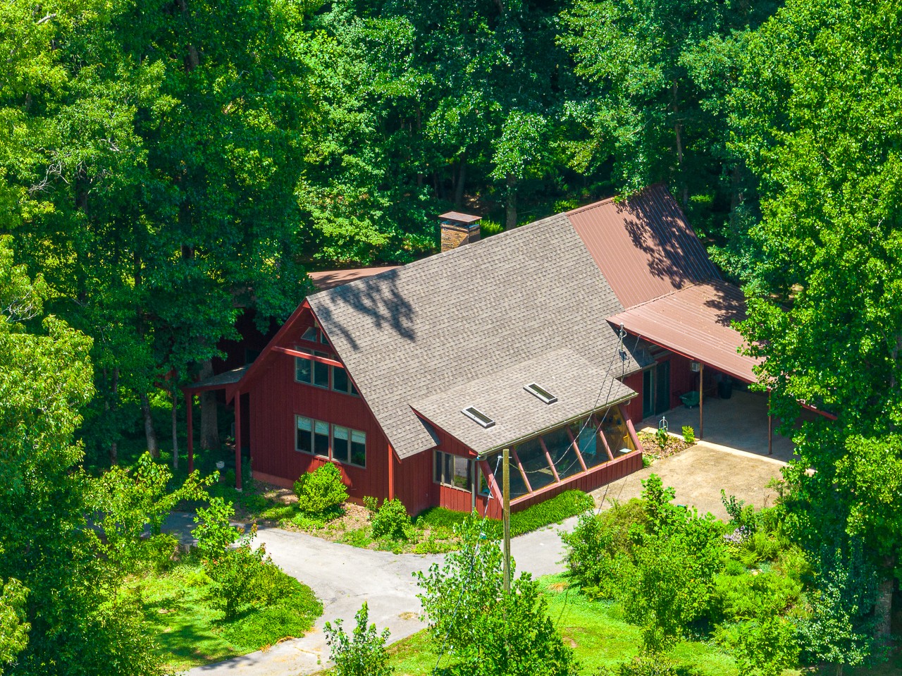 253 Hunter Road Fayetteville, TN 37334 - Photo 4 of 61 an aerial view of a house with a big yard and large trees