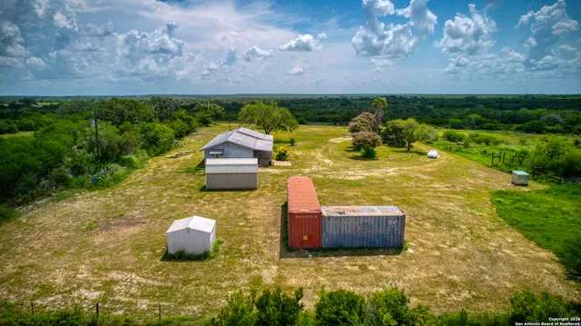a view of a lake with a yard