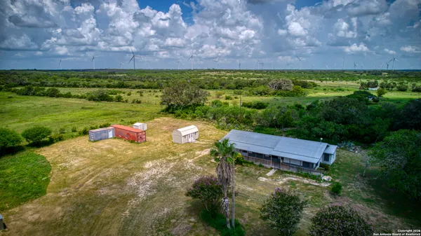 a view of a yard with an outdoor space