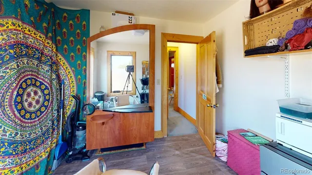 a bathroom with sink mirror and bathtub