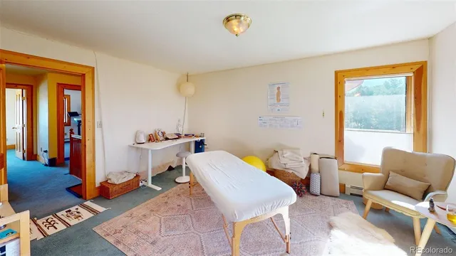 a room with furniture and a window