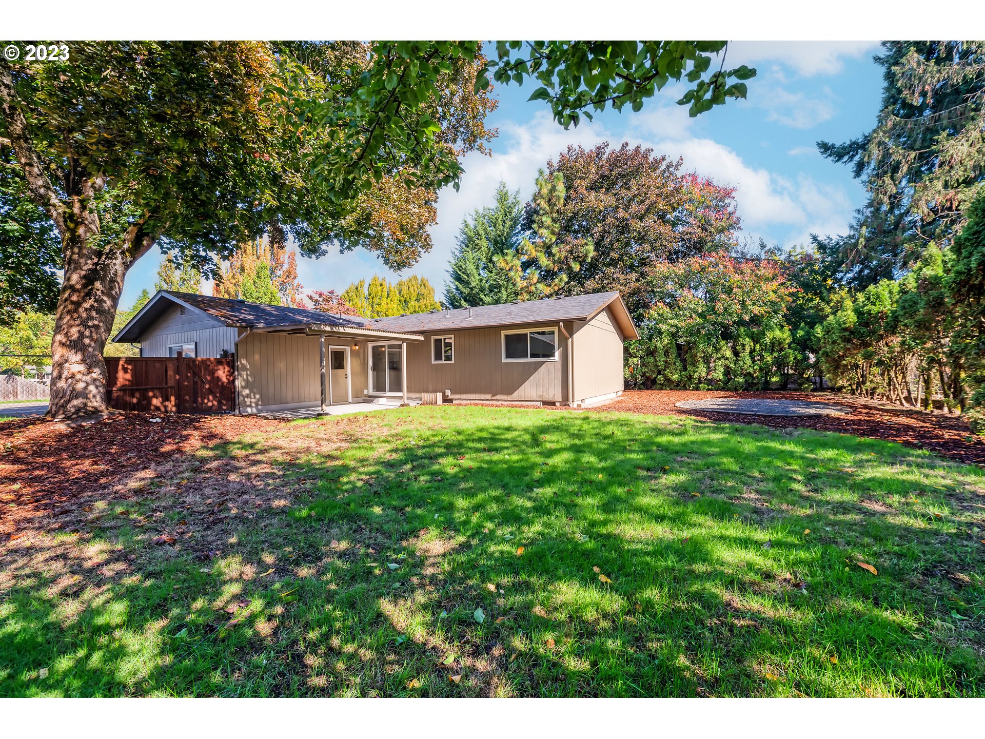 4439 Camellia Street Springfield, OR 97478 - Photo 26 of 31 a front view of a house with garden