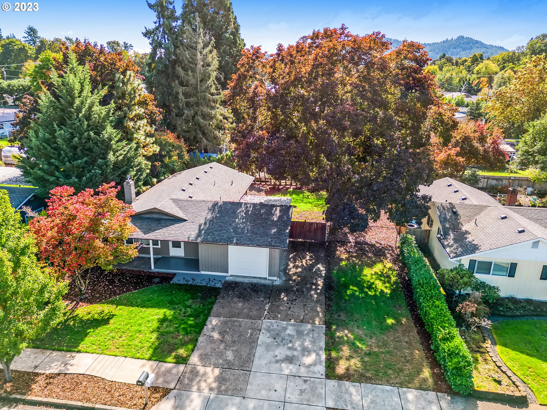 4439 Camellia Street Springfield, OR 97478 - Photo 5 of 31 an aerial view of a house with a yard basket ball court and outdoor seating