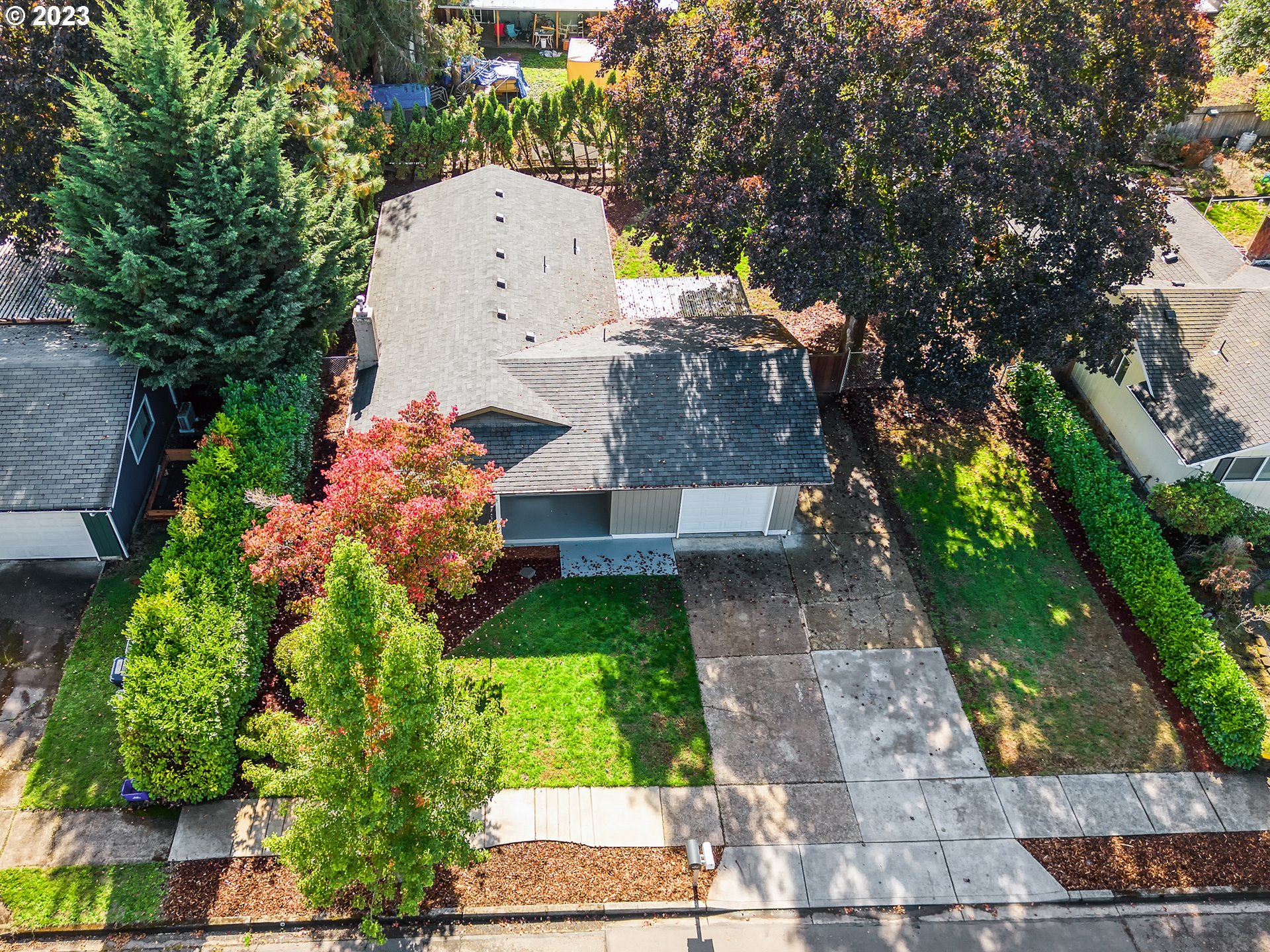 4439 Camellia Street Springfield, OR 97478 - Photo 7 of 31 a view of statue in a garden