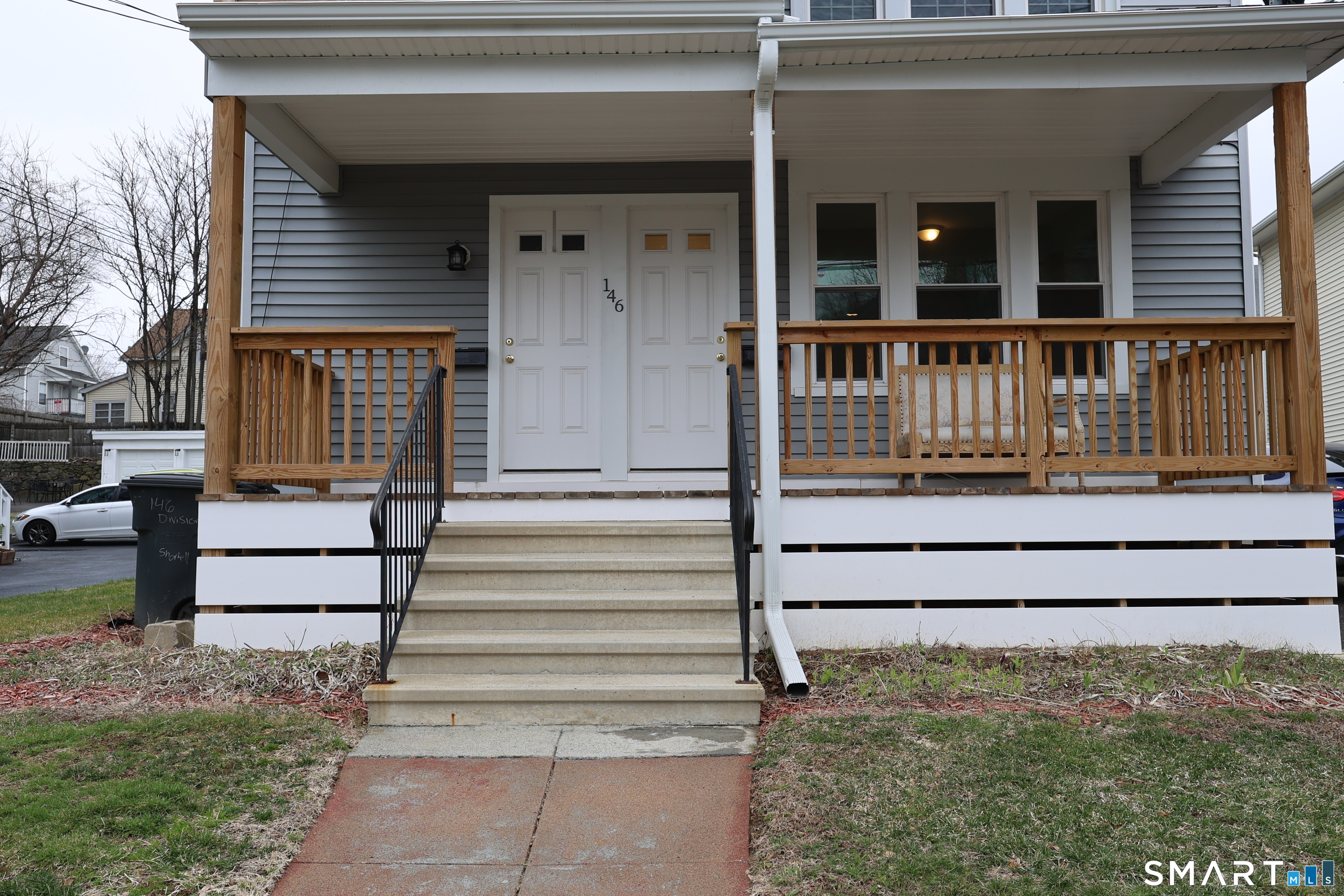 146 Division Street, Unit 1 Ansonia, CT 06401 - Photo 2 of 27 a view of wooden house with a porch