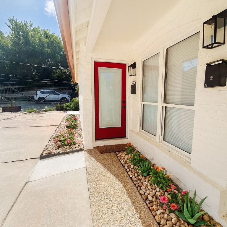 1005 West Martin Luther King Jr Boulevard, Unit B Austin, TX 78701 - Photo 2 of 29 a view of a entryway door of the house