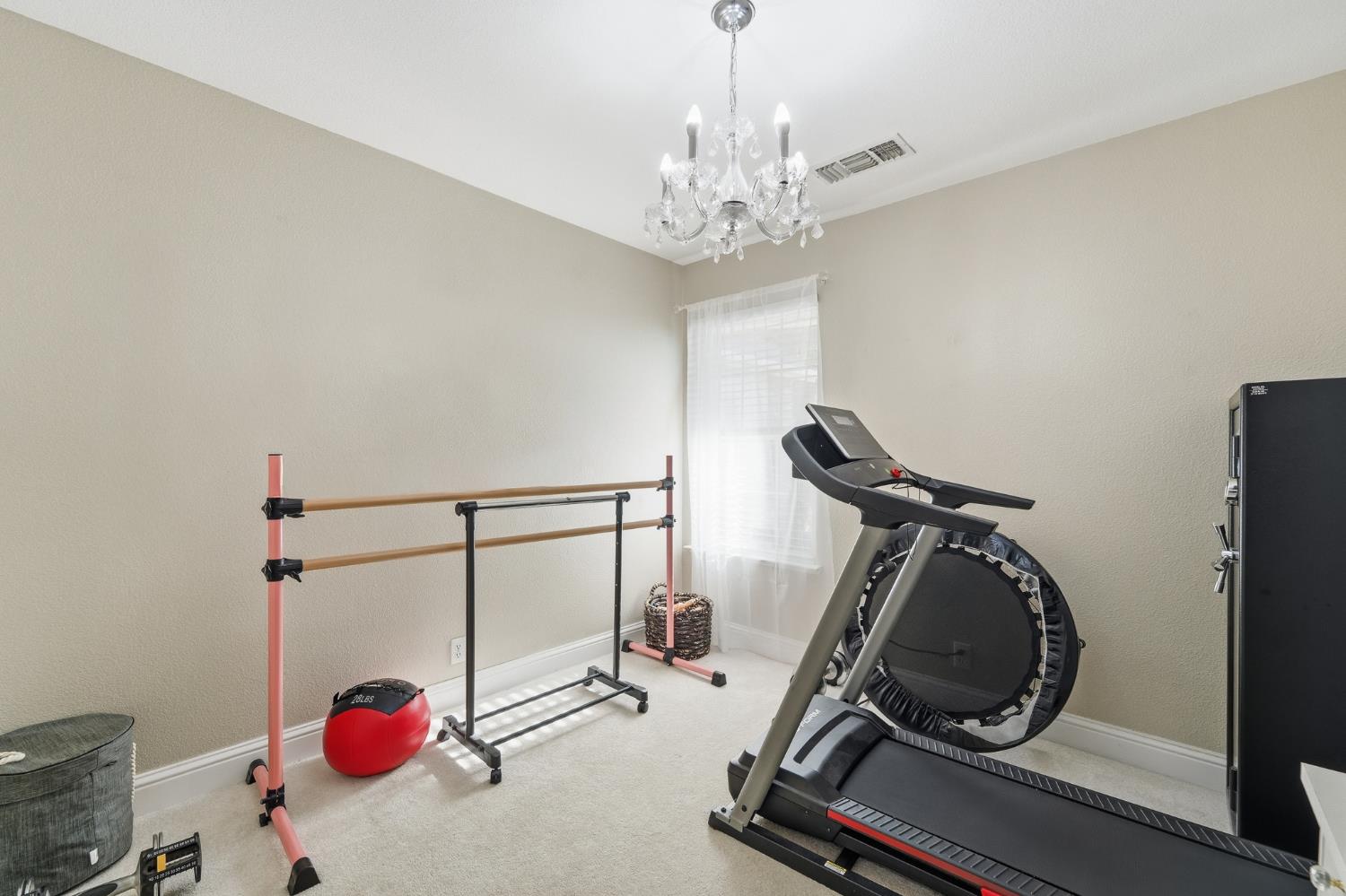 2220 Ellison Drive Modesto, CA 95355 - Photo 30 of 53 a view of a room with gym equipment