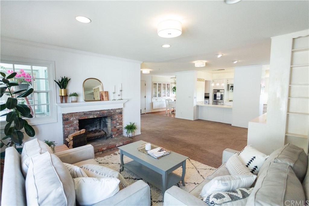 395 Pineridge Street Brea, CA 92821 - Photo 12 of 39 a living room with furniture and a fireplace