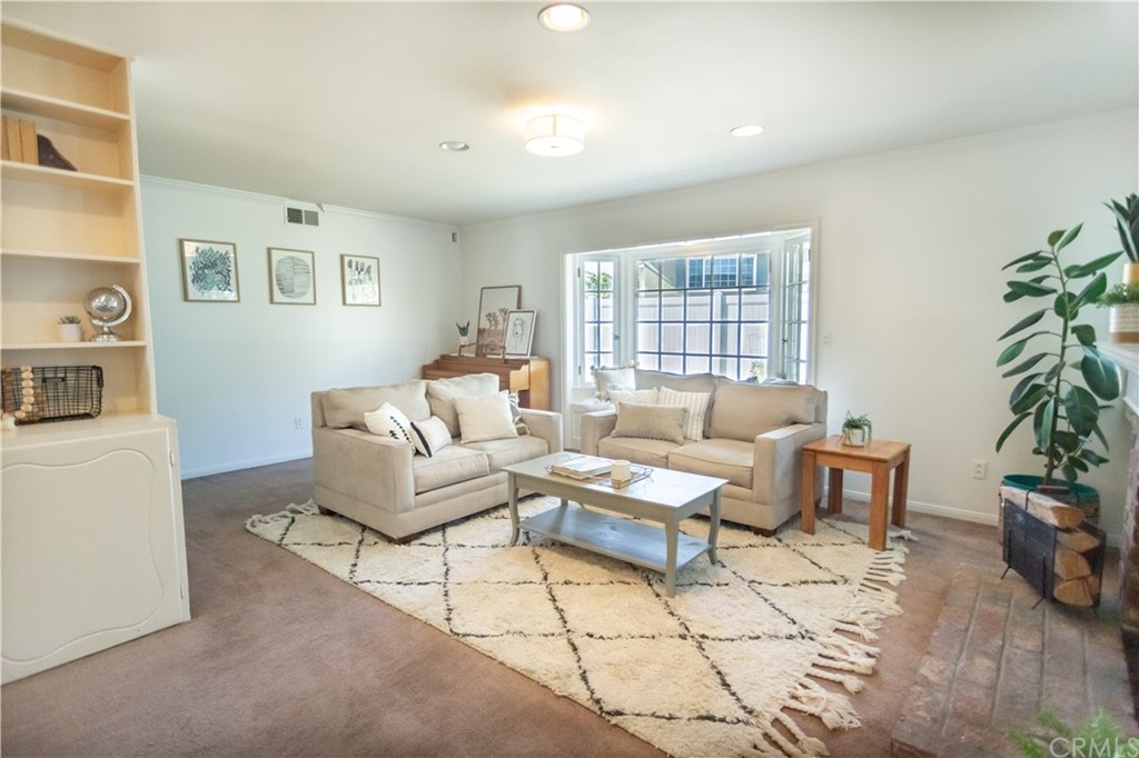 395 Pineridge Street Brea, CA 92821 - Photo 13 of 39 a living room with furniture and a potted plant