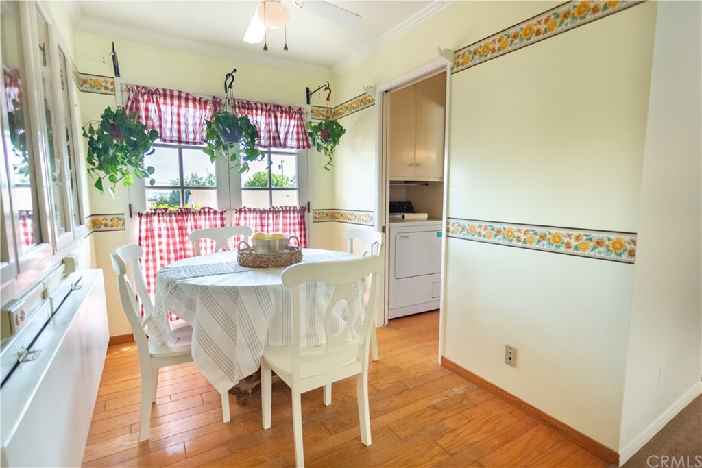 395 Pineridge Street Brea, CA 92821 - Photo 17 of 39 a dining room with furniture and wooden floor