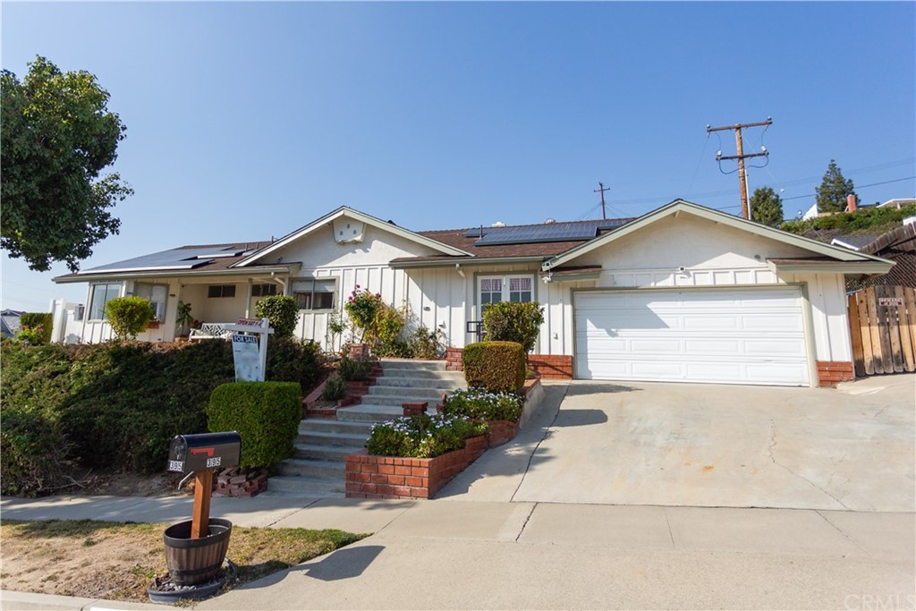 395 Pineridge Street Brea, CA 92821 - Photo 2 of 39 a front view of a house with garden