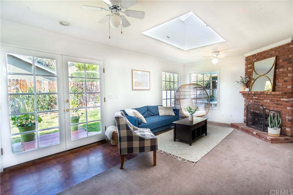 395 Pineridge Street Brea, CA 92821 - Photo 23 of 39 a living room with furniture and a fireplace