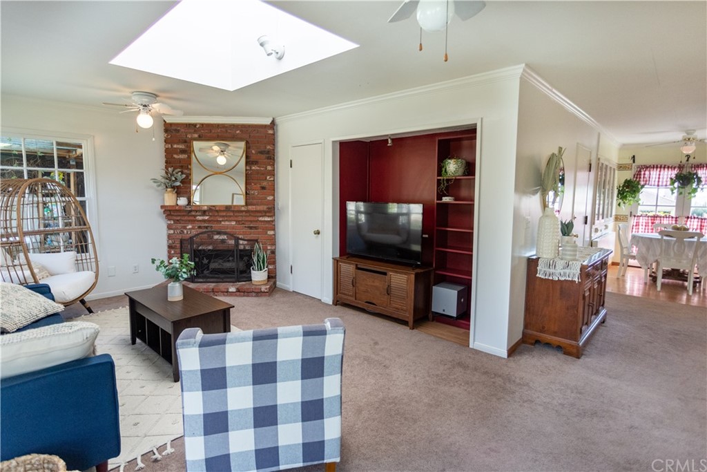 395 Pineridge Street Brea, CA 92821 - Photo 24 of 39 a living room with furniture and a flat screen tv