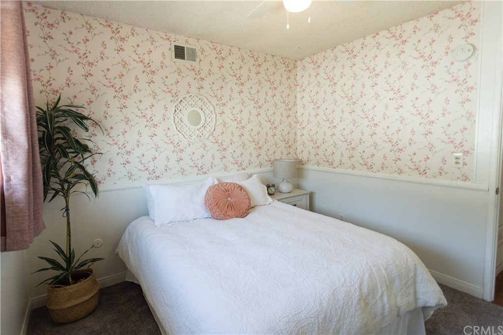 395 Pineridge Street Brea, CA 92821 - Photo 29 of 39 a bedroom with a bed and a potted plant