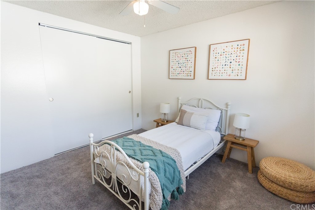 395 Pineridge Street Brea, CA 92821 - Photo 31 of 39 a bedroom with a bed and a lamp