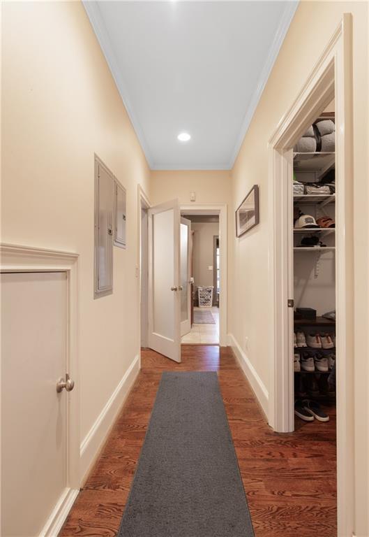 451 Hascall Road Northwest Atlanta, GA 30309 - Photo 12 of 26 a view of a hallway with wooden floor and living room