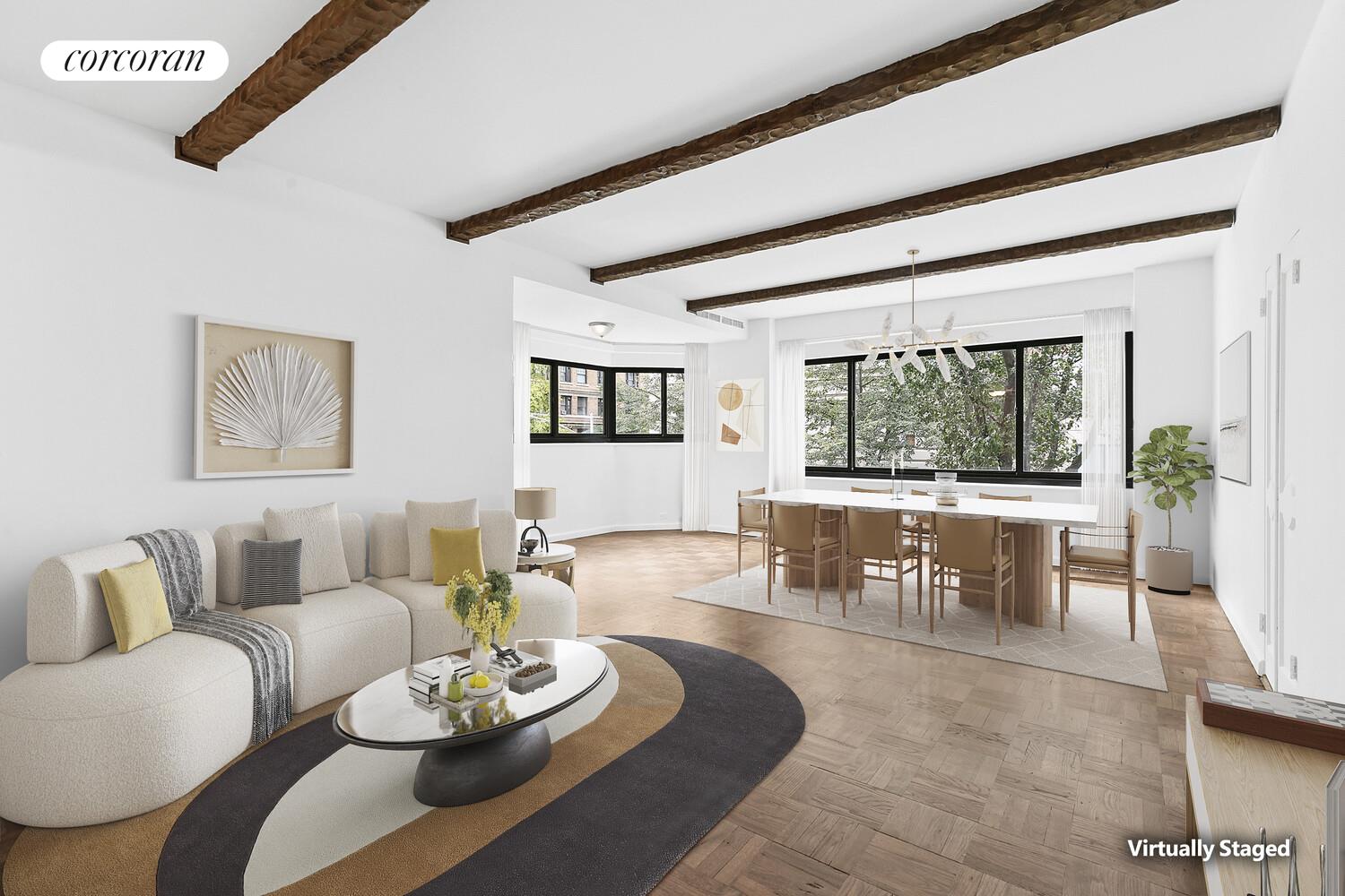 25 East 83rd Street, Unit 2E Manhattan, NY 10028 - Photo 2 of 19 a living room with furniture and a large window