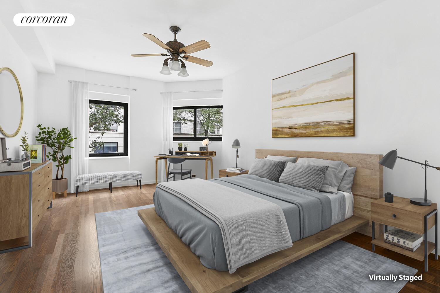 25 East 83rd Street, Unit 2E Manhattan, NY 10028 - Photo 5 of 19 a bedroom with a bed and a chandelier