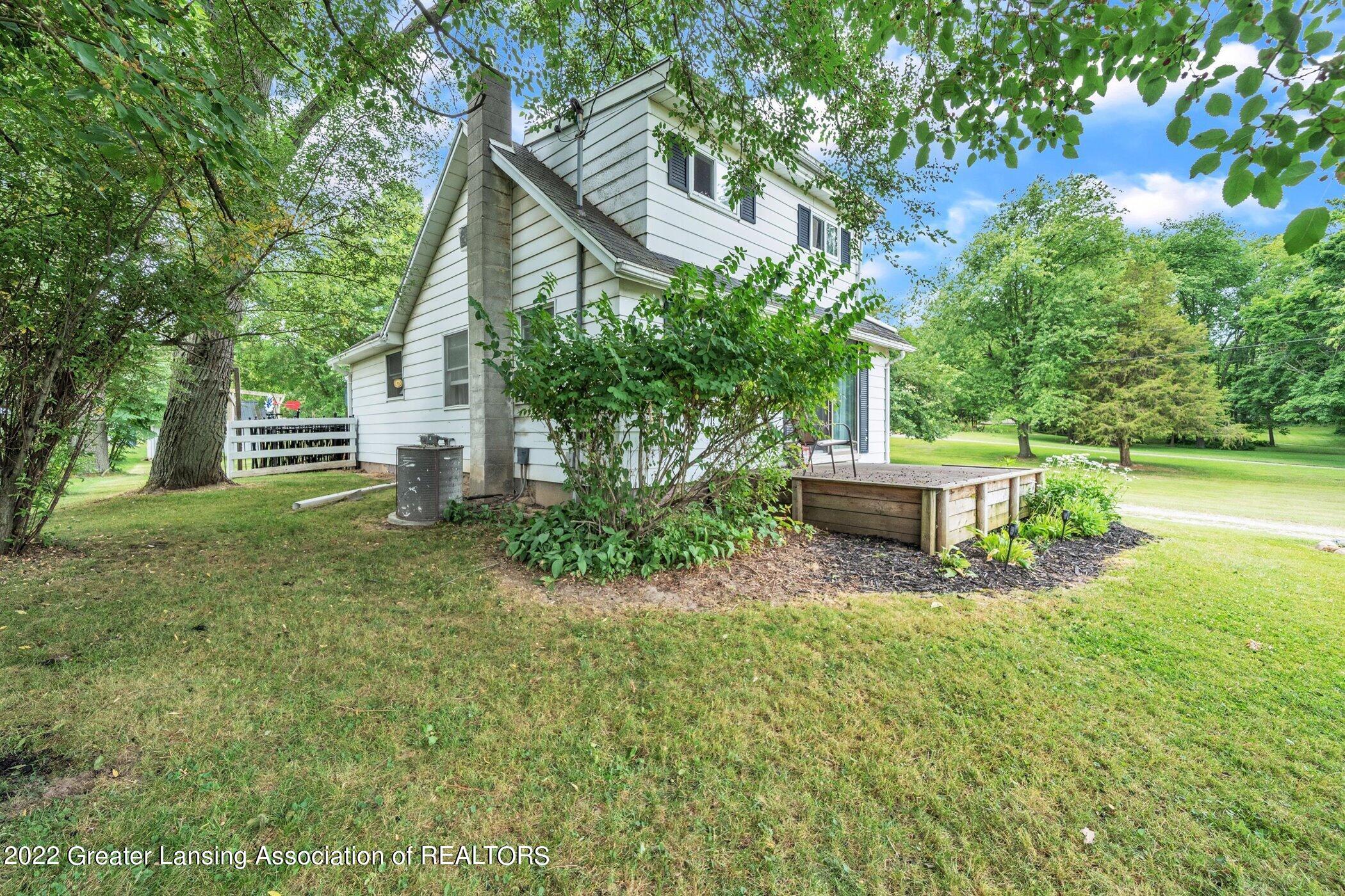 5939 Harper Road Holt, MI 48842 - Photo 3 of 34 Side