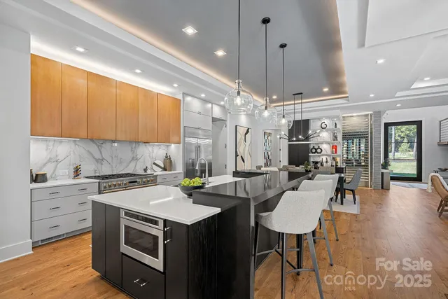 a outdoor space with patio fireplace furniture and a flat screen tv