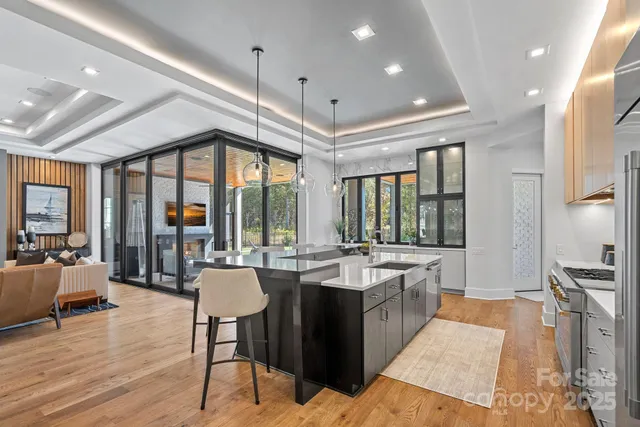 a kitchen with a sink stove and refrigerator