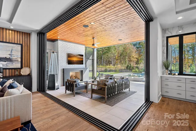 a kitchen with a sink and chandelier