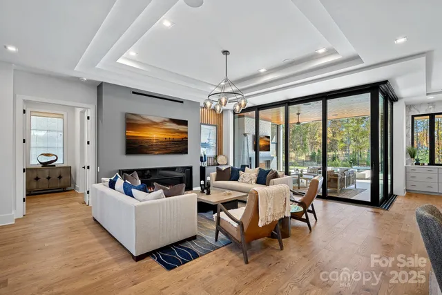 a kitchen with a table chairs stove and cabinets
