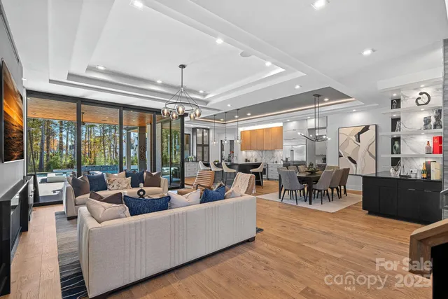 a kitchen with a sink a stove and cabinets
