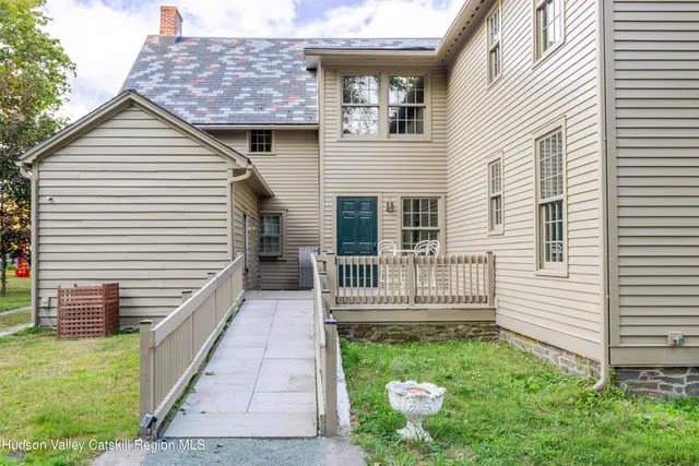 a view of a balcony with wooden floor