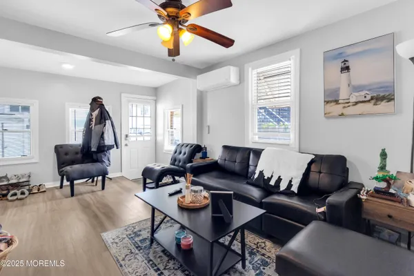 a kitchen with a stove a table and chairs