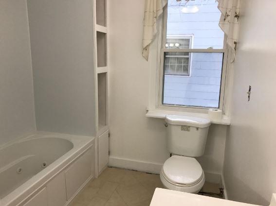 73 Inverness Street Portland, ME 04103 - Photo 12 of 23 New bathroom towel cubby and new tub...
