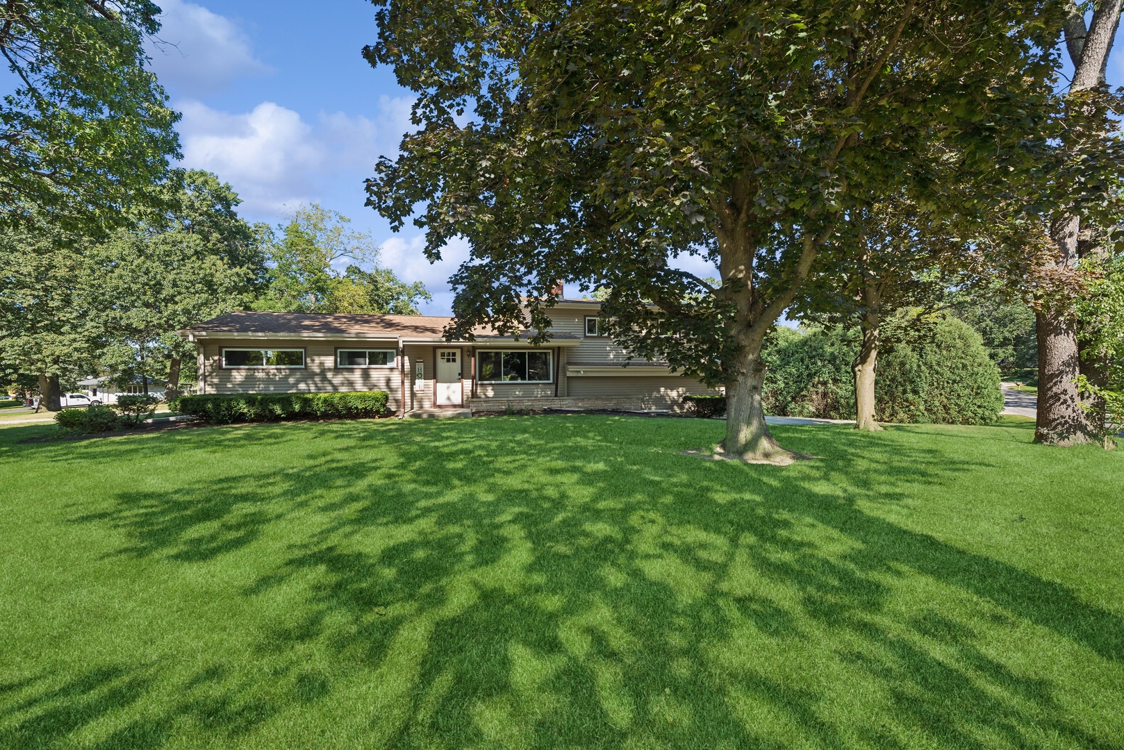4612 Blue Jay Road Harvard, IL 60033 - Photo 1 of 14 a view of house with garden space and trees