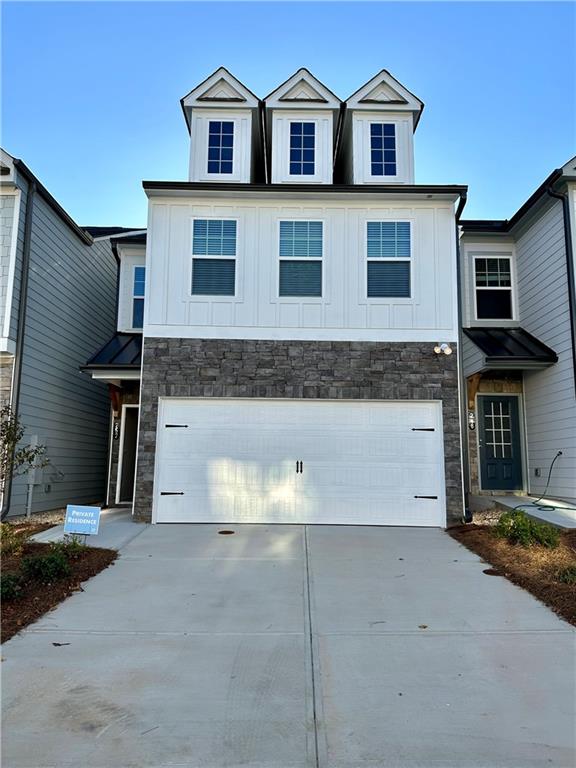 252 Whitetail Circle Canton, GA 30115 - Photo 1 of 1 a front view of a house with a yard and garage