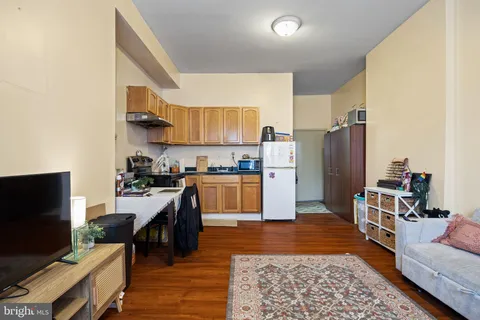a view of a kitchen with washer and dryer