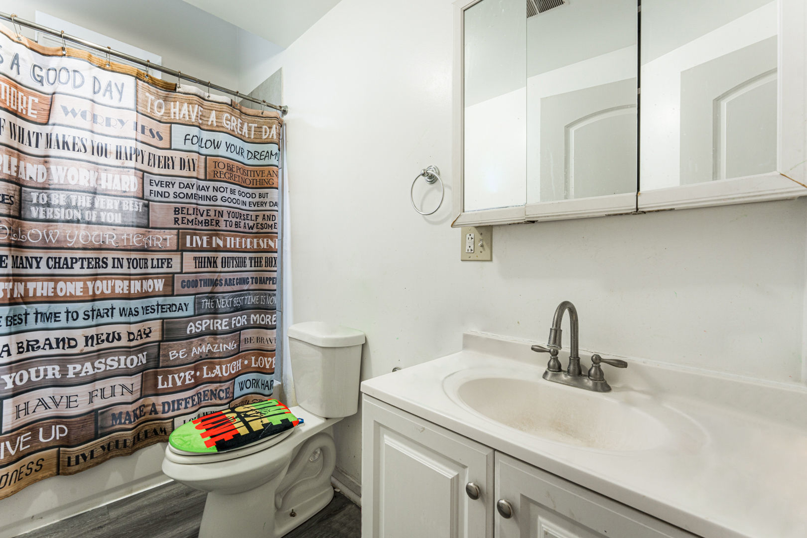 2008 South Pulaski Road Chicago, IL 60623 - Photo 10 of 16 a bathroom with a sink toilet and a shower