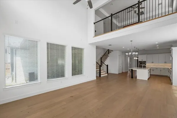 a view of a livingroom with furniture and a window